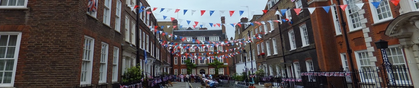 street with white, blue and red bunting