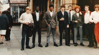 Photograph of mixed group of men. Credit: Robert Russell