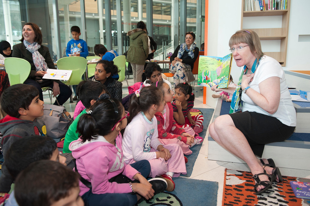 Group of children at the library listening to a story