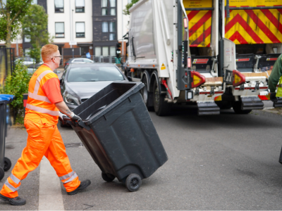Veolia staff with bin and waste lorry