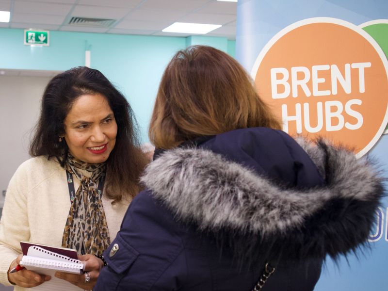 Brent Hubs advisor speaking with resident