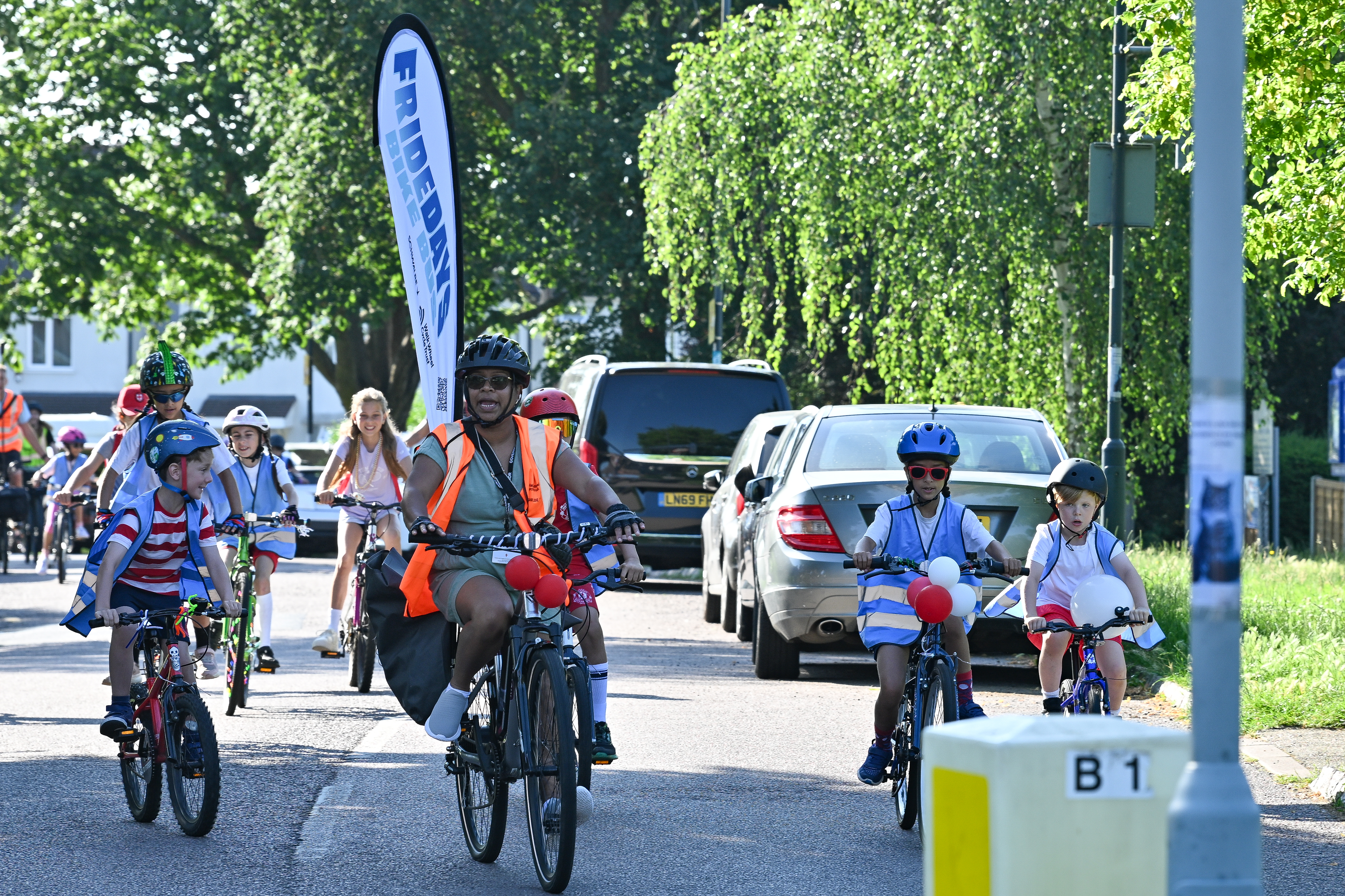 children cycling in bike bus scheme