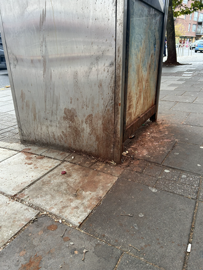 Paan stains on a telephone box