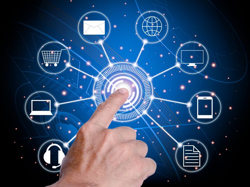 Finger pressing a button unlocking the digital world and potential everyday benefits