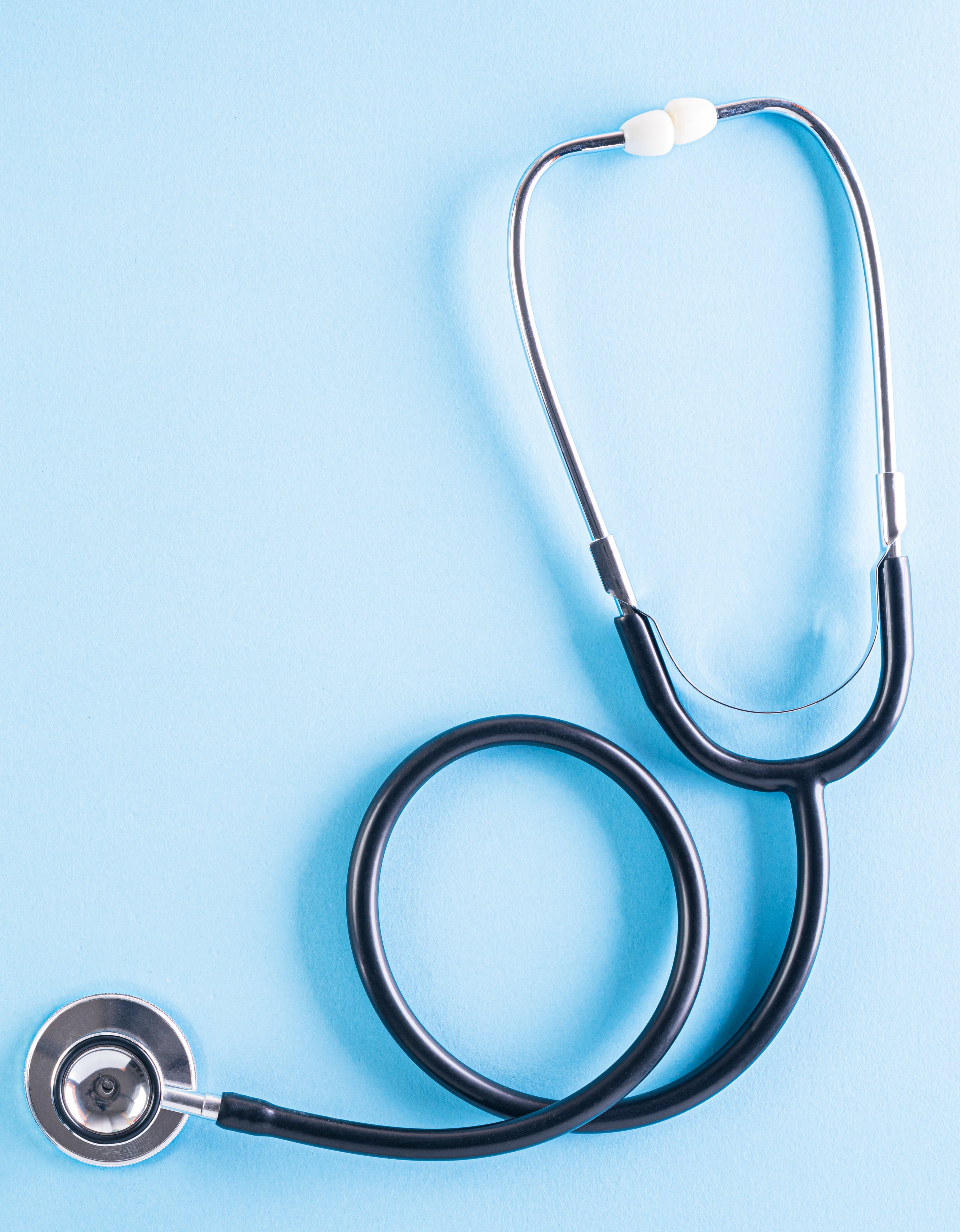 picture of a stethoscope on a blue background