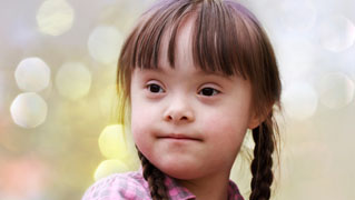 A young girl with Downs Syndrome