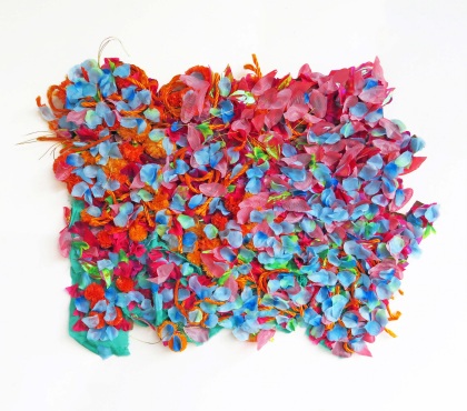 Exhibition image - different coloured flower petals arranged in a pattern